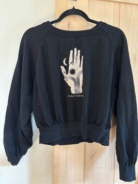 Christy Dawn x Real Fun Wow “It’s All in Your Hands” cropped sweatshirt.